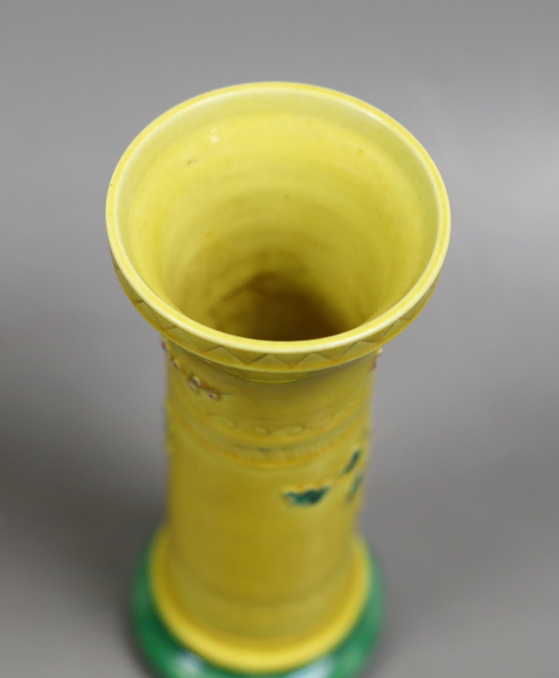 A 19th century Chinese (Qing) yellow background vase, 15 cms high.